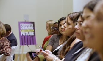 a row of people in a crowd
