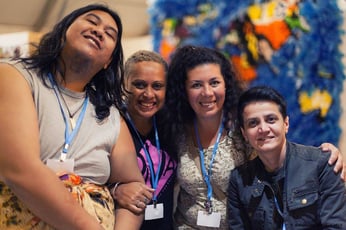 a group of women smiling