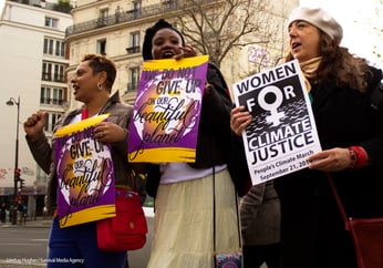 a group of women smiling