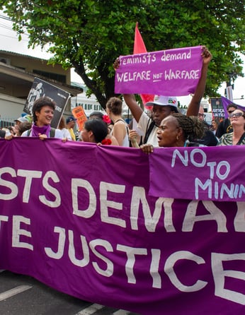 Feminists demanding climate justice at the People's March at COP30. Photo by Ariana Rodriguez-Gitler